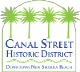 Logo for the Canal Street Historic District featuring palm trees and text.