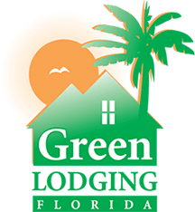 Logo for Green Lodging Florida featuring a house, palm tree, and sunset.